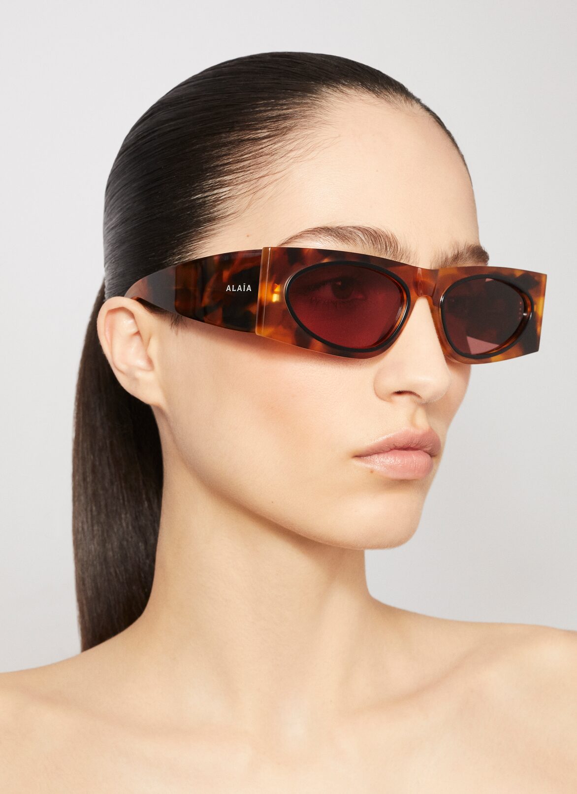 CAT EYE SUNGLASSES ALAÏA BROWNISH YELLOW CAT EYE SUNGLASSES